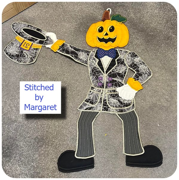 Mr Pumpkin head by Margaret