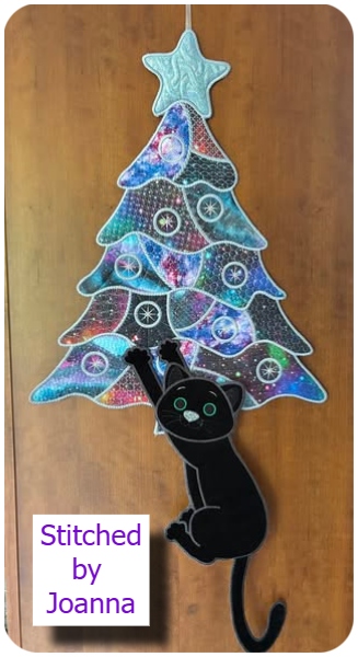 Dangling Cat and crazy patch christmas tree