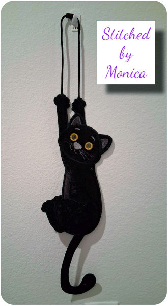 Dangling Cat by Monica