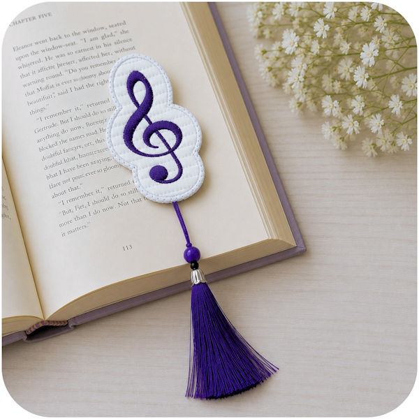 Front and back Free In the hoop Music Bookmark and Bag Tag