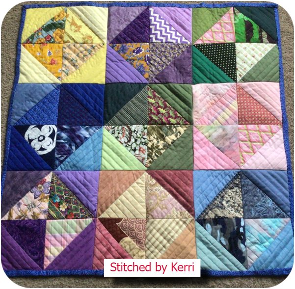 Free half square triangle quilt by Kerri