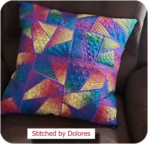 Large crazy patch cushion by Dolores