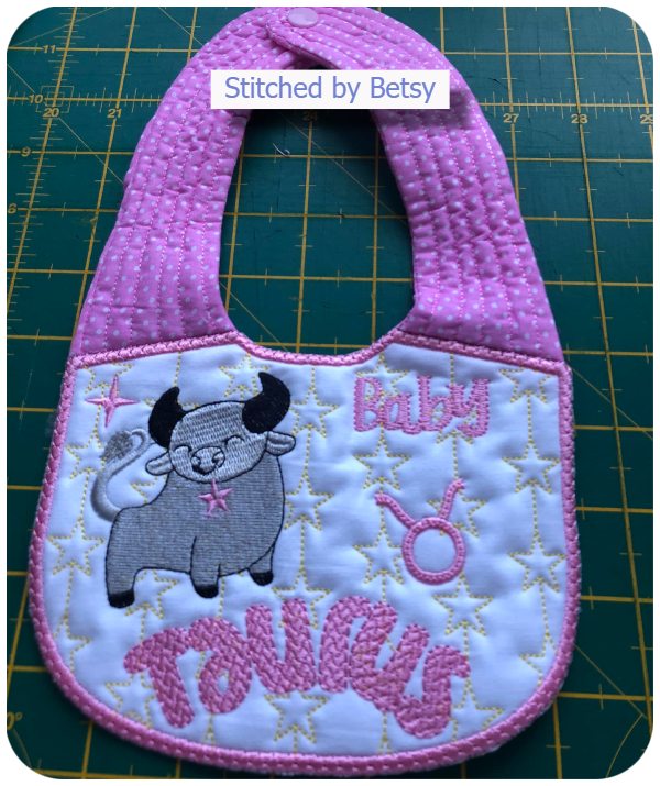 Zodiac Bib by Betsy