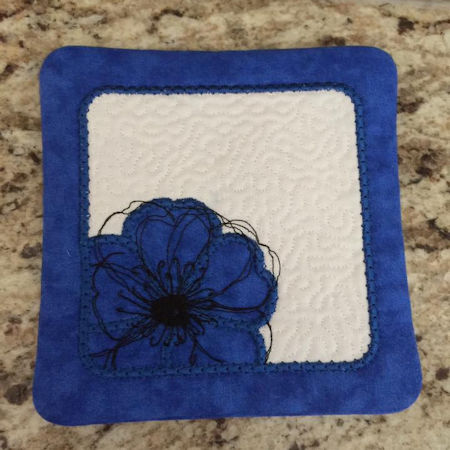 In the hoop Poppy Coaster