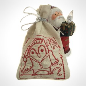 ""Christmas Giftbag"" is a Free Christmas Machine Embroidery Design designed by Suzy from Kreative Kiwi!